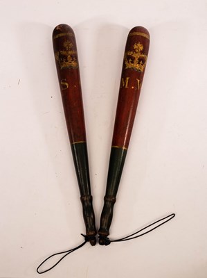 Lot 573 - A pair of painted Victorian truncheons, 64cm long