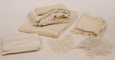 Lot 586 - A quantity of lace to include a bedspread and...