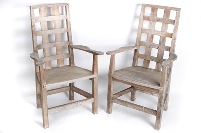 Lot 602 - A pair of yew wood garden armchairs with...