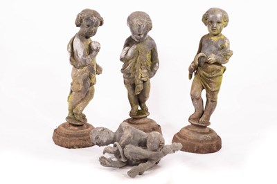 Lot 606 - Three lead figures of putti, the tallest 64cm...