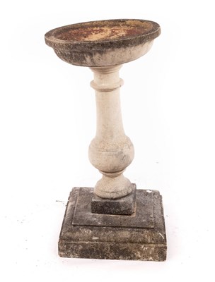 Lot 611 - A reconstituted stone bird bath, 92cm high