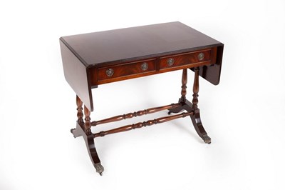 Lot 618 - A mahogany two-flap sofa table fitted two...