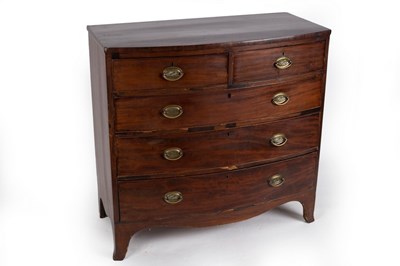 Lot 621 - An early 19th Century mahogany bowfront chest,...