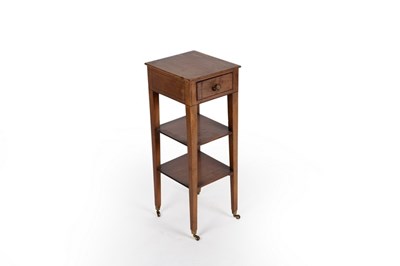 Lot 622 - A Regency three-tier side table, the top tier...