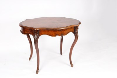 Lot 653 - An Edwardian walnut centre table, cross banded...