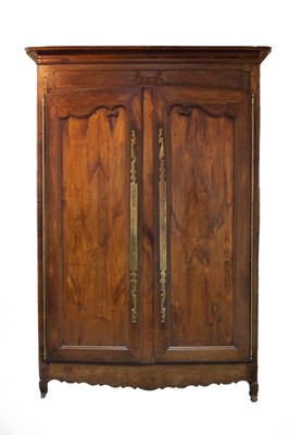 Lot 657 - A 19th Century chestnut armoire with moulded...