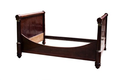 Lot 661 - An Empire mahogany bed, the head and foot...