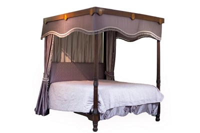 Lot 678 - A 19th Century mahogany four-poster bed, the...