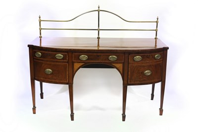 Lot 724 - A George III mahogany and inlaid bowfront...