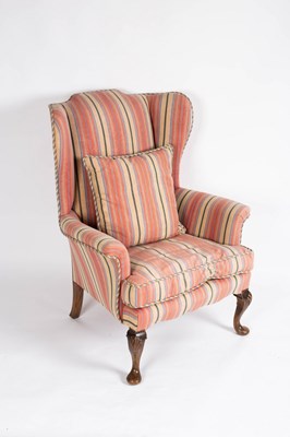 Lot 744 - An 18th Century style wingback armchair