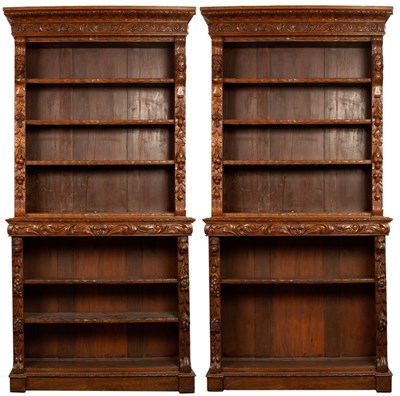 Lot 760 - A pair of Jacobean Revival oak open bookcases,...