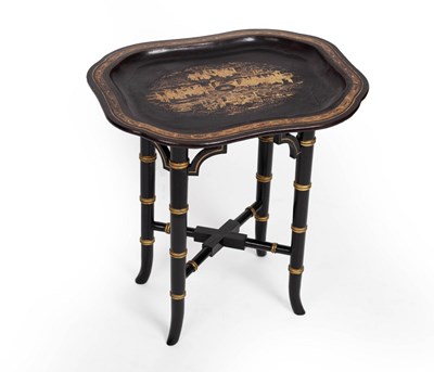 Lot 775 - A Chinese export black lacquer tray with gilt...