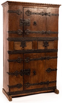 Lot 785 - A 16th Century Westphalian standing cupboard,...