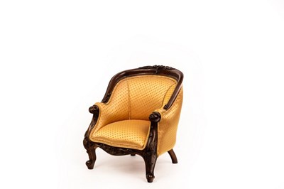 Lot 797 - A child's upholstered tub armchair