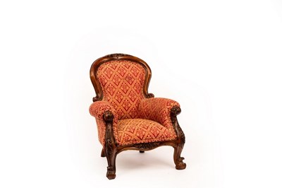 Lot 798 - A child's upholstered armchair