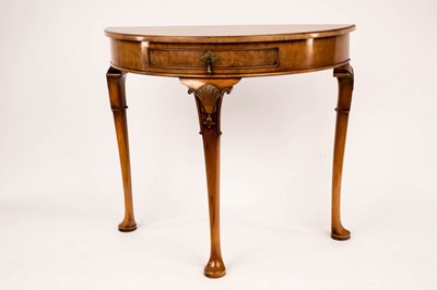 Lot 802 - A Queen Anne style D-shaped walnut table,...