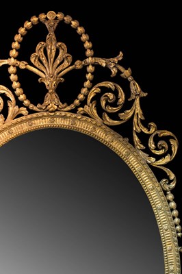 Lot 813 - A fine giltwood and gesso oval wall mirror of...