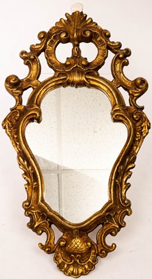 Lot 820 - A gilt plaster Florentine style mirror, the...