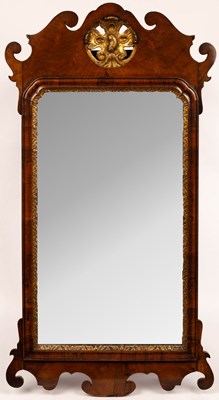 Lot 822 - A George III walnut fret framed mirror with...