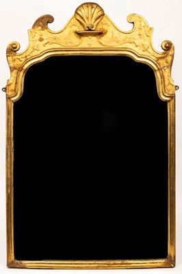 Lot 824 - A George I style gilt framed mirror with shell...