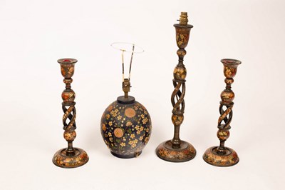 Lot 844 - A pair of Kashmiri candlesticks, 40cm high,...