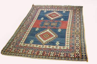 Lot 850 - A Hamadan rug, the central blue ground field...