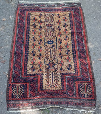 Lot 854 - A Baluch prayer rug with central geometric...