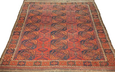 Lot 874 - An Afghan carpet circa 1900, with three rows...