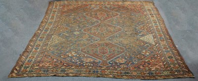 Lot 875 - A Kashgai rug, the central ground set three...