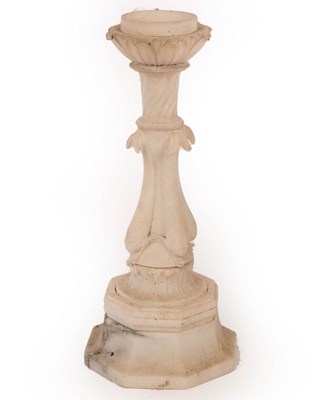 Lot 882 - An alabaster column with quadruple dolphin...