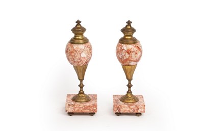 Lot 884 - A pair of gilt metal and orange veined marble...