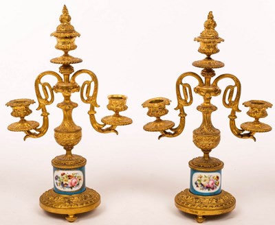 Lot 897 - A pair of French two branch three-light table...