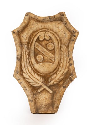 Lot 898 - An alabaster panel of cartouche shape with...