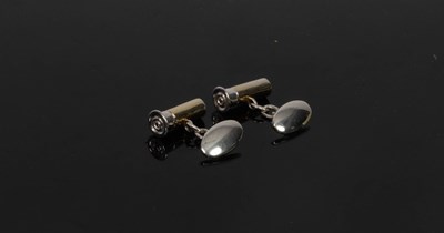 Lot 1007 - A pair of silver and silver gilt cufflinks of...