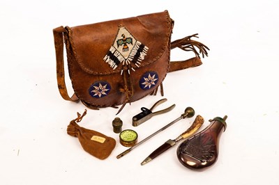 Lot 1011 - An American rawhide shooters possibles bag,...