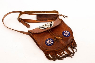 Lot 1011 - An American rawhide shooters possibles bag,...