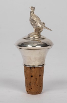 Lot 1012 - A silver bottle stopper with pheasant finial,...