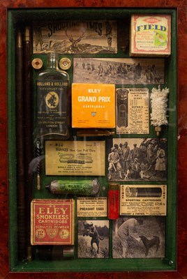 Lot 1013 - A wall hanging display case containing...