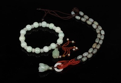 Lot 44 - A jade bead bracelet, a similar necklace and...