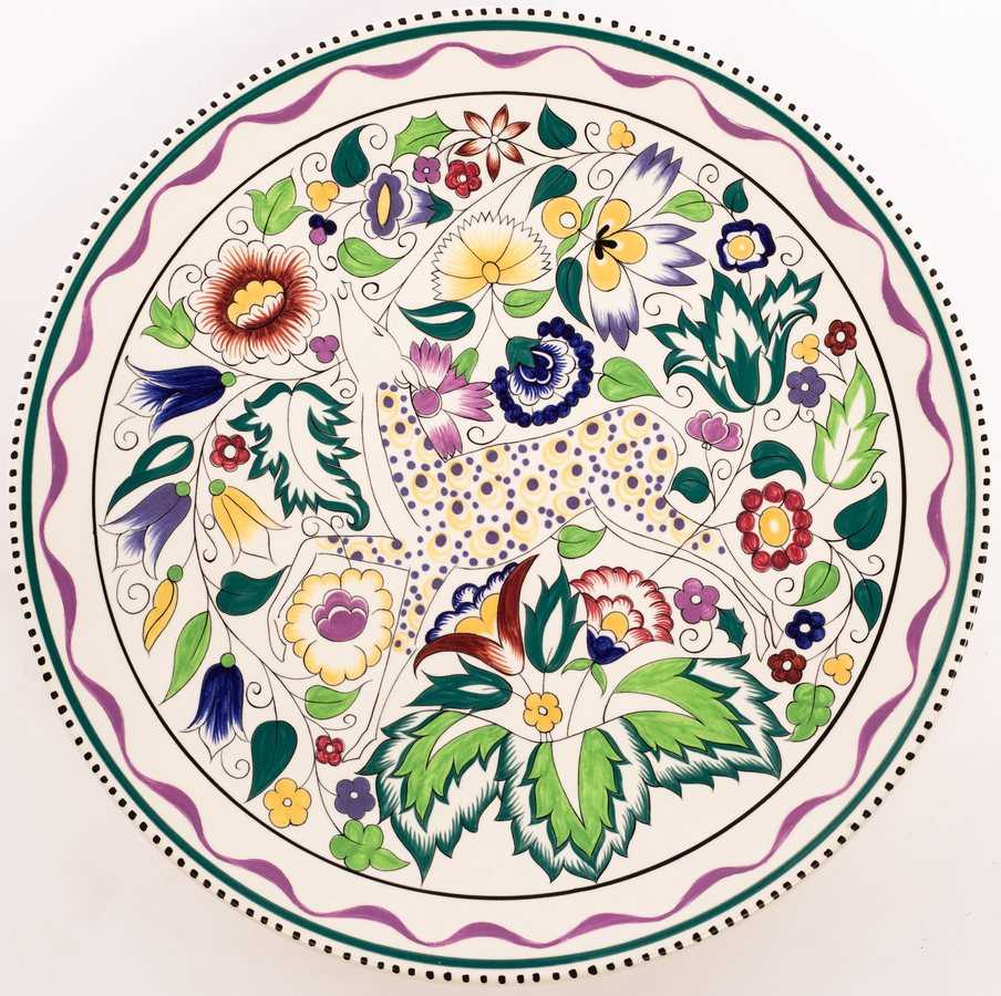 Lot 131 - Poole Pottery, a Persian deer plate, hand...