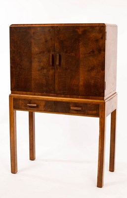 Lot 550 - Heals, a 1930s Art Deco walnut cocktail...