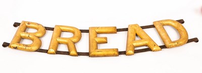 Lot 553 - An advertising Bread sign (originally for...