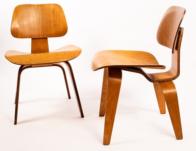 Lot 575 - Charles and Ray Eames, two DCW plywood chairs,...