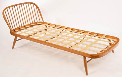Lot 580 - Lucien Ercolini for Ercol, an elm and beech...