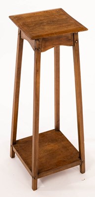 Lot 615 - An Arts & Crafts jardinière stand with lower...