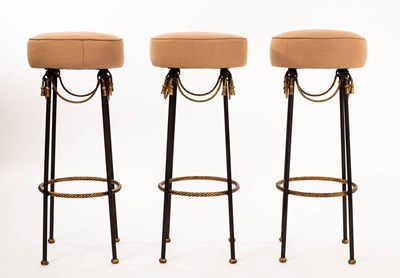 Lot 617 - Three American bar stools with upholstered...