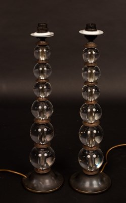Lot 625 - A pair of table lights, the column of each six...