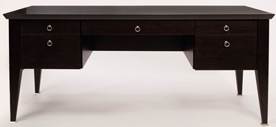 Lot 630 - An Italian ebonised oak kneehole desk, fitted...