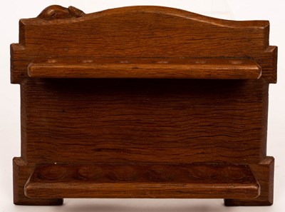 Lot 634 - A Robert 'Mouseman' Thompson oak pipe rack,...