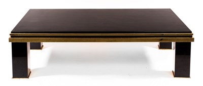 Lot 646 - A Maison Jansen black and gold coffee table,...